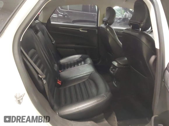2015 Ford Fusion SE Hybrid with VIN 3FA6P0LU8FR215788, listed as a IAAI auction lot 42038194 with 136,949 mi miles and . Bid and sale history available at DreamBid. Image 8.