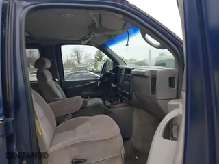 2004 Chevrolet Express Passenger with VIN 1GBFG15T441159106, listed as a IAAI auction lot 41999210 with 245,286 mi miles. Bid and sale history available at carsss.com. Image 5.