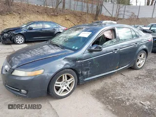 2007 Acura TL with VIN 19UUA66287A023249, listed as a IAAI auction lot 42091228 with 242,269 mi miles. Bid and sale history available at carsss.com. Image 2.
