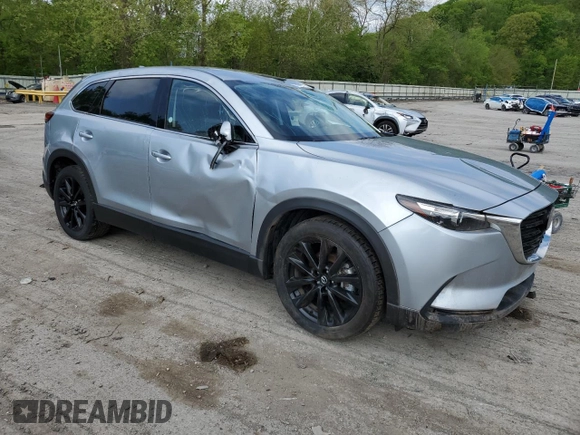 2023 Mazda CX-9 Touring Plus with VIN JM3TCBAY1P0659517, listed as a Copart auction lot 56396565 with 50,544 mi miles and Salvage title. Bid and sale history available at DreamBid. Image 4.