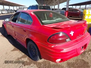 2002 Pontiac Grand Am SE1 with VIN 1G2NF52F52C109417, listed as a IAAI auction lot 41392869 with 184,877 mi miles. Bid and sale history available at carsss.com. Image 3.