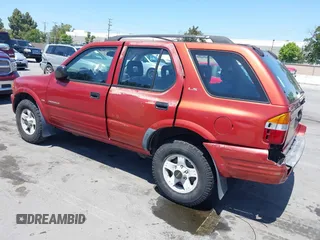 1999 Isuzu Rodeo S z VIN 4S2CK58W4X4362837, wystawiony jako IAAI lot #42403621 z przebiegiem 177 690 mil mil oraz . Historia ofert i sprzedaży dostępna na DreamBid. Obrazek 3.