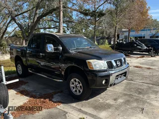 2004 Nissan Titan LE with VIN 1N6AA07B24N549732, listed as a Copart auction lot 87638965 with 199,373 mi miles and Clean Title. Bid and sale history available at carsss.com. Image 1.