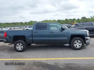 2017 Chevrolet Silverado 1500 LT with VIN 3GCPCREC9HG277153, listed as a IAAI auction lot 41948045 with 126,373 mi miles. Bid and sale history available at carsss.com. Image 13.