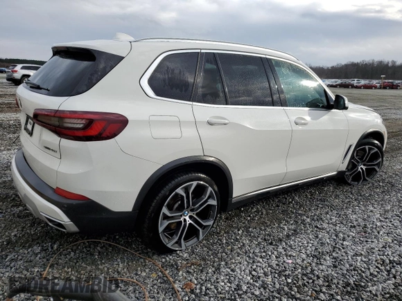 2021 BMW X5 sDrive40i with VIN 5UXCR4C04M9E30879, listed as a Copart auction lot 39577953 with 19,276 mi miles. Bid and sale history available at carsss.com. Image 3.
