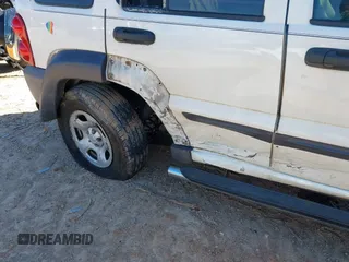 2004 Jeep Liberty Sport with VIN 1J4GK48K44W267418, listed as a IAAI auction lot 41591036 with 181,453 mi miles and . Bid and sale history available at DreamBid. Image 6.