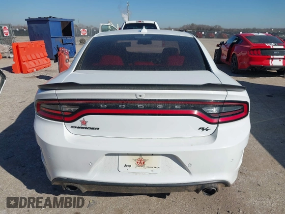 2019 Dodge Charger R/T with VIN 2C3CDXCT9KH629940, listed as a IAAI auction lot 41651890 with 87,628 mi miles and . Bid and sale history available at DreamBid. Image 16.