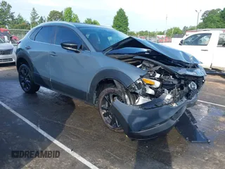 2024 Mazda CX-30 S Preferred with VIN 3MVDMBCM6RM673142, listed as a IAAI auction lot 42213773 with 25,599 mi miles and . Bid and sale history available at DreamBid. Image 1.