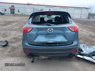 2016 Mazda CX-5 Touring with VIN JM3KE4CY8G0858045, listed as a IAAI auction lot 41941537 with 103,532 mi miles. Bid and sale history available at carsss.com. Image 16.