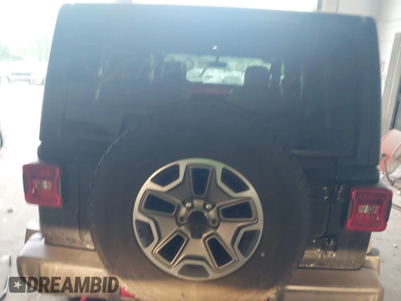 2021 Jeep Wrangler Unlimited Rubicon with VIN 1C4HJXFN2MW587168, listed as a IAAI auction lot 42472309 with 66,272 mi miles and . Bid and sale history available at DreamBid. Image 16.
