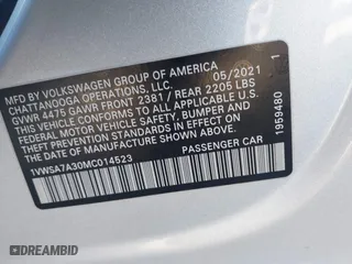 2021 Volkswagen Passat 2.0T SE with VIN 1VWSA7A30MC014523, listed as a IAAI auction lot 41443657 with 101,350 mi miles. Bid and sale history available at carsss.com. Image 9.