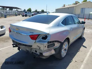 2018 Chevrolet Impala Premier with VIN 2G1125S35J9127166, listed as a IAAI auction lot 42476024 with 115,172 mi miles and . Bid and sale history available at DreamBid. Image 4.