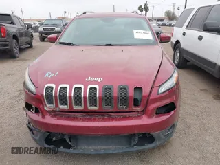 2016 Jeep Cherokee Latitude with VIN 1C4PJLCS1GW247965, listed as a IAAI auction lot 41623805 with 114,187 mi miles. Bid and sale history available at carsss.com. Image 12.