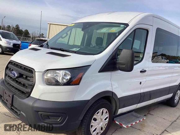 2020 Ford Transit Passenger XL z VIN 1FDAX2C86LKA63962, wystawiony jako IAAI lot #42674555 z przebiegiem 27 261 mil mil oraz . Historia ofert i sprzedaży dostępna na DreamBid. Obrazek 4.
