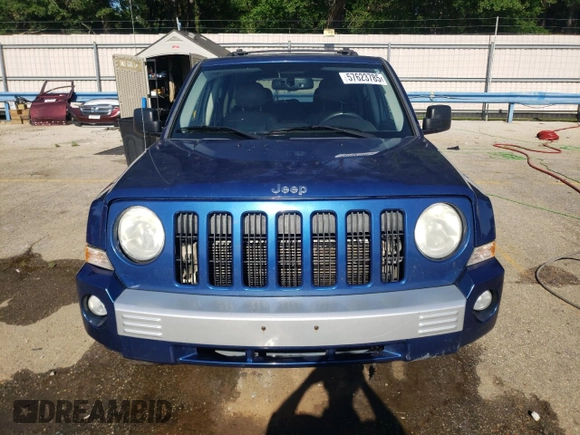 2010 Jeep Patriot Limited z VIN 1J4NF4GB4AD519060, wystawiony jako Copart lot #57623785 z przebiegiem 187 257 mil mil oraz Szkoda całkowita • Salvage title. Historia ofert i sprzedaży dostępna na DreamBid. Obrazek 5.