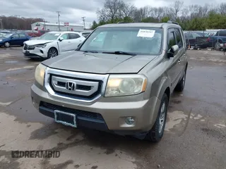 2009 Honda Pilot EX-L with VIN 5FNYF48569B002035, listed as a IAAI auction lot 41838347 with 198,849 mi miles. Bid and sale history available at carsss.com. Image 18.