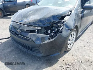 2023 Toyota Corolla LE with VIN 5YFB4MDE7PP028548, listed as a IAAI auction lot 41810081 with 34,352 mi miles and . Bid and sale history available at DreamBid. Image 6.