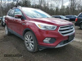 2017 Ford Escape Titanium with VIN 1FMCU9J98HUB68357, listed as a Copart auction lot 53839855 with 252,398 mi miles and Clean Title. Bid and sale history available at carsss.com. Image 4.