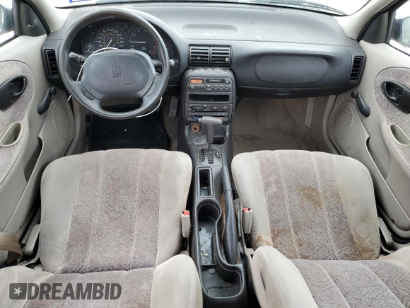 1996 Saturn SL with VIN 1G8ZK5278TZ255742, listed as a Copart auction lot 79050024 with 83,205 mi miles and Salvage title. Bid and sale history available at DreamBid. Image 8.