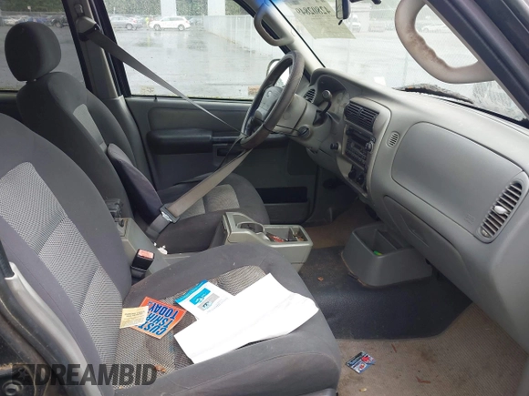 2003 Ford Explorer Sport Trac XLS z VIN 1FMZU67E73UC26464, wystawiony jako IAAI lot #42802849 z przebiegiem 228 139 mil mil oraz . Historia ofert i sprzedaży dostępna na DreamBid. Obrazek 5.