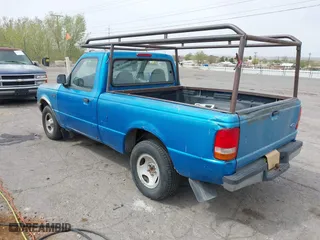 1995 Ford Ranger XLT with VIN 1FTCR10X7STA57755, listed as a IAAI auction lot 42023603 with 302,746 mi miles. Bid and sale history available at carsss.com. Image 3.