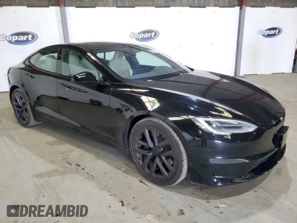 2021 Tesla Model S Plaid with VIN 5YJSA1E68MF432125, listed as a Copart auction lot 60843515 with 5,581 mi miles and Salvage title. Bid and sale history available at DreamBid. Image 4.