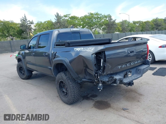 2019 Toyota Tacoma SR with VIN 3TMCZ5AN3KM207783, listed as a IAAI auction lot 42375280 with 55,784 mi miles and . Bid and sale history available at DreamBid. Image 3.