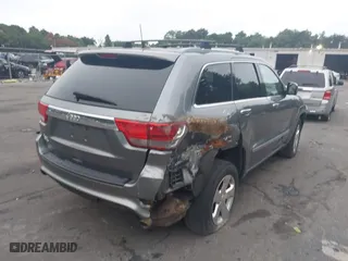 2011 Jeep Grand Cherokee Limited with VIN 1J4RR5GG6BC715356, listed as a IAAI auction lot 40158736 with 146,567 mi miles. Bid and sale history available at carsss.com. Image 4.