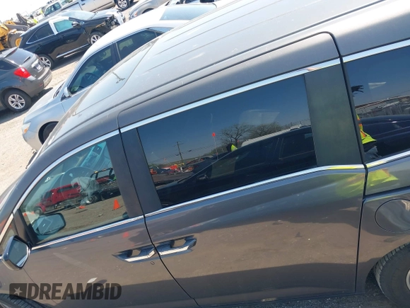 2013 Honda Odyssey EX-L with VIN 5FNRL5H65DB011071, listed as a IAAI auction lot 41992265 with 192,624 mi miles and . Bid and sale history available at DreamBid. Image 14.