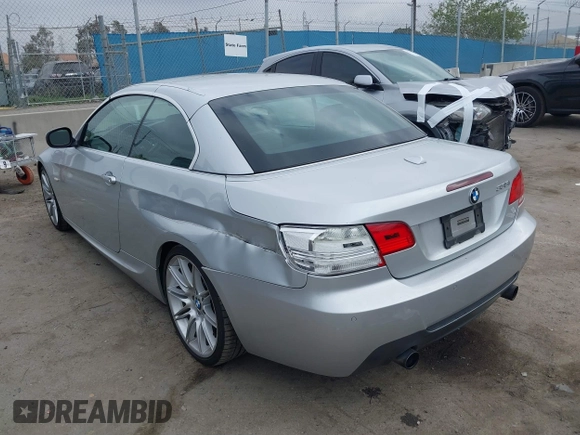 2010 BMW 3 Series 335i with VIN WBAWL7C53AP474127, listed as a IAAI auction lot 41871518 with 111,136 mi miles. Bid and sale history available at carsss.com. Image 3.