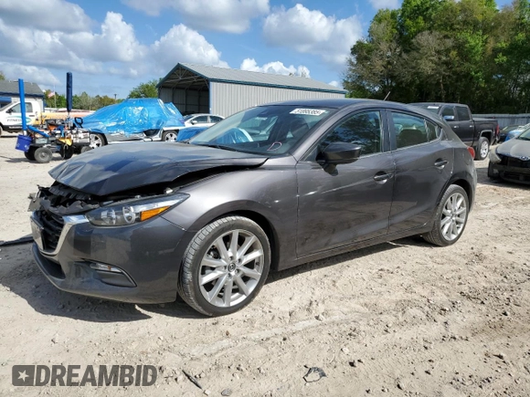 2017 Mazda 3 Touring with VIN 3MZBN1L77HM117864, listed as a Copart auction lot 51895385 with 63,076 mi miles and Salvage Title. Bid and sale history available at carsss.com. Image 1.