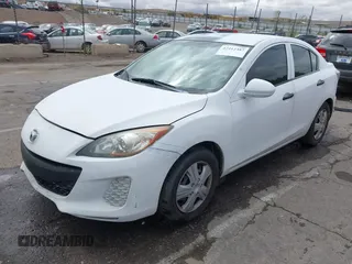 2013 Mazda 3 i SV with VIN JM1BL1TGXD1729153, listed as a IAAI auction lot 42212487 with 217,339 mi miles and . Bid and sale history available at DreamBid. Image 2.