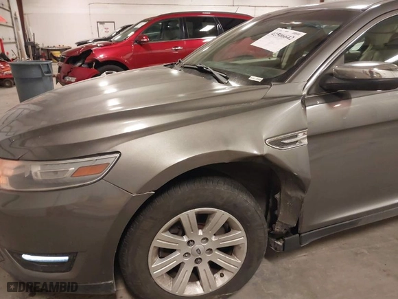 2013 Ford Taurus Limited with VIN 1FAHP2F86DG226697, listed as a IAAI auction lot 41506642 with 150324 miles. Bid and sale history available at carsss.com. Image 6.