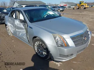 2011 Cadillac CTS z VIN 1G6DA5EY9B0170888, wystawiony jako IAAI lot #41812334 z przebiegiem 85 482 mil mil oraz . Historia ofert i sprzedaży dostępna na DreamBid. Obrazek 1.