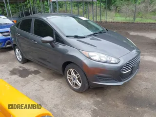 2019 Ford Fiesta SE z VIN 3FADP4BJ7KM155094, wystawiony jako IAAI lot #42186126 z przebiegiem 93 684 mil mil oraz . Historia ofert i sprzedaży dostępna na DreamBid. Obrazek 1.