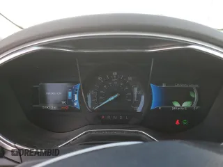 2015 Ford Fusion S Hybrid with VIN 3FA6P0UU9FR190933, listed as a Copart auction lot 50123655 with 151,901 mi miles and Salvage Title. Bid and sale history available at carsss.com. Image 9.