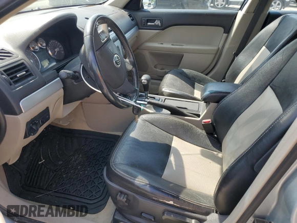 2007 Mercury Milan Premier with VIN 3MEHM08ZX7R638968, listed as a Copart auction lot 59958485 with 164,942 mi miles and Salvage title. Bid and sale history available at DreamBid. Image 7.