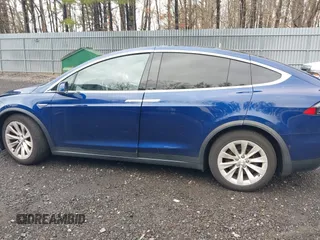 2016 Tesla Model X 70D with VIN 5YJXCBE20GF016173, listed as a IAAI auction lot 41809725 with 116,198 mi miles. Bid and sale history available at carsss.com. Image 14.