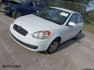 2011 Hyundai Accent GLS with VIN KMHCN4AC0BU613032, listed as a IAAI auction lot 42089042 with 132,518 mi miles. Bid and sale history available at carsss.com. Image 2.