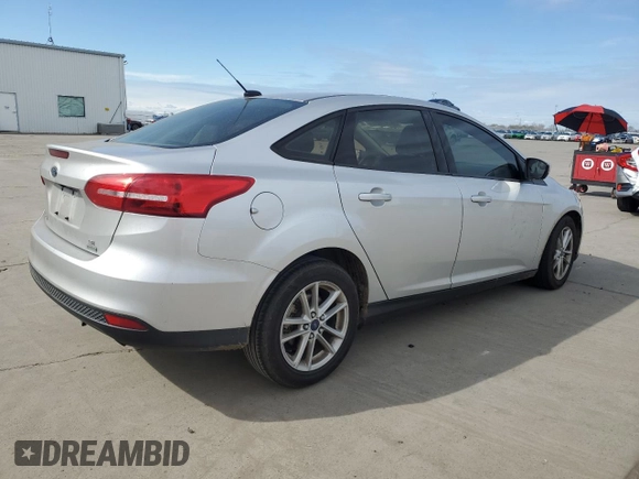 2018 Ford Focus SE with VIN 1FADP3FE3JL261145, listed as a Copart auction lot 47411315 with 98,581 mi miles and Salvage Title. Bid and sale history available at carsss.com. Image 3.