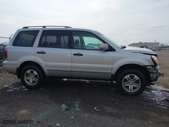 2005 Honda Pilot EX-L with NAVI with VIN 2HKYF18725H534538, listed as a IAAI auction lot 41677322 with 157,987 mi miles. Bid and sale history available at carsss.com. Image 13.