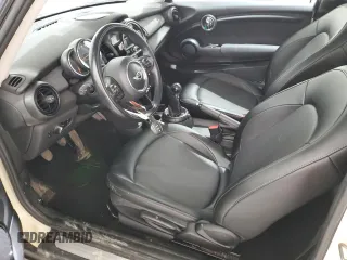 2015 MINI Hardtop with VIN WMWXM5C58FT973235, listed as a Copart auction lot 49988015 with 119,683 mi miles and Salvage Title. Bid and sale history available at DreamBid. Image 7.