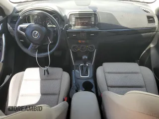 2015 Mazda CX-5 Touring with VIN JM3KE2CY5F0548826, listed as a Copart auction lot 52686565 with 139,602 mi miles and Salvage Title. Bid and sale history available at carsss.com. Image 8.