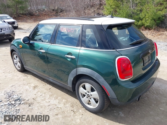 2016 MINI Hardtop 4 Door with VIN WMWXU1C57G2D09401, listed as a IAAI auction lot 42013695 with 43,437 mi miles and . Bid and sale history available at DreamBid. Image 3.