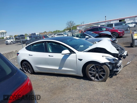 2023 Tesla Model 3 z VIN 5YJ3E1EA5PF553275, wystawiony jako IAAI lot #42132154 z przebiegiem Nie podano mil oraz . Historia ofert i sprzedaży dostępna na DreamBid. Obrazek 13.