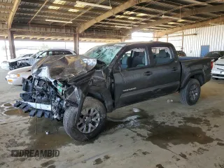 2018 Toyota Tacoma SR5 with VIN 3TMAZ5CN9JM075289, listed as a Copart auction lot 52409365 with 65,793 mi miles and Salvage Title. Bid and sale history available at DreamBid. Image 1.