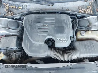 2015 Dodge Charger SE with VIN 2C3CDXBG1FH840060, listed as a IAAI auction lot 42111676 with 165,479 mi miles and . Bid and sale history available at carsss.com. Image 10.