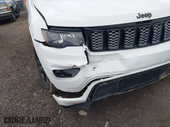 2018 Jeep Grand Cherokee Altitude with VIN 1C4RJFAG2JC284301, listed as a IAAI auction lot 41832657 with 97,160 mi miles and . Bid and sale history available at DreamBid. Image 17.