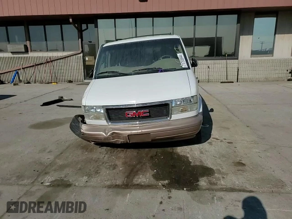 2003 GMC Safari z VIN 1GKEL19X03B503236, wystawiony jako Copart lot #71755844 z przebiegiem 109 438 mil mil oraz Szkody całkowita. Historia ofert i sprzedaży dostępna na DreamBid. Obrazek 11.