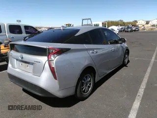 2017 Toyota Prius Two z VIN JTDKBRFU1H3551324, wystawiony jako IAAI lot #41893385 z przebiegiem 305 445 mil mil oraz . Historia ofert i sprzedaży dostępna na DreamBid. Obrazek 4.
